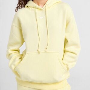 Nike Sportswear Phoenix Fleece sweatpant and hoodie set.

Lemon Chiffon/Sail